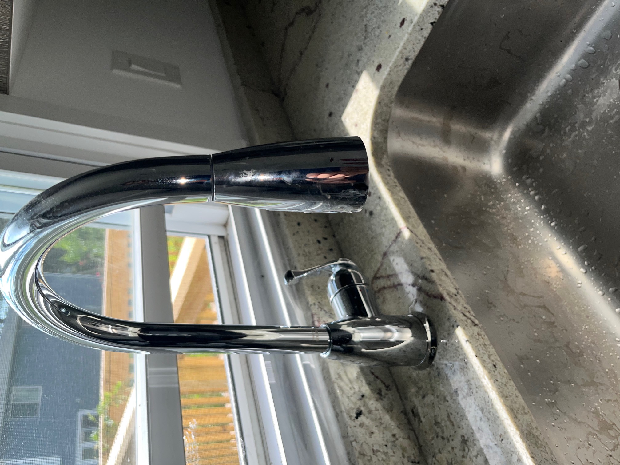 All-Plumb-Rooter Plumber installing sink faucet